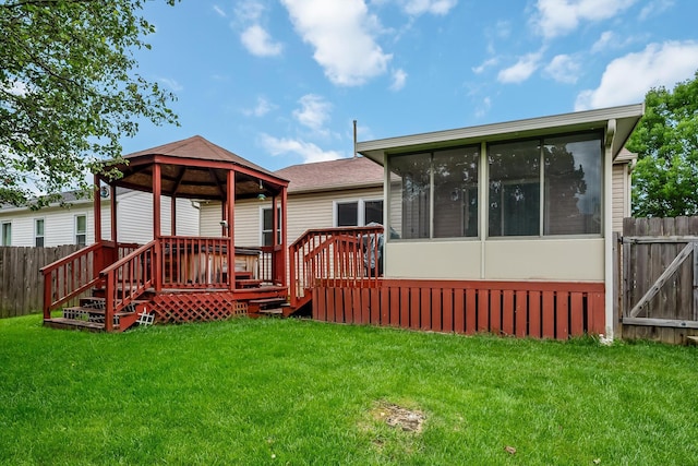 1344 Bluffton Ct, Columbus, OH 43228 - rear view of house featuring a gazebo, a sunroom, and a deck