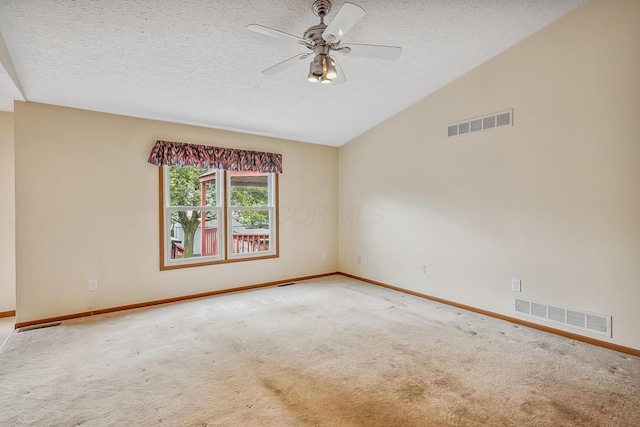1344 Bluffton Ct, Columbus, OH 43228 - unfurnished room with carpet floors, a textured ceiling, vaulted ceiling, and ceiling fan