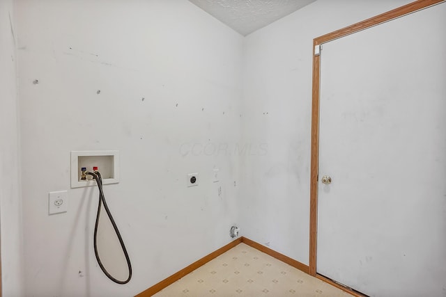 1344 Bluffton Ct, Columbus, OH 43228 - laundry room with electric dryer hookup, light floors, hookup for a washing machine, gas dryer hookup, and a textured ceiling