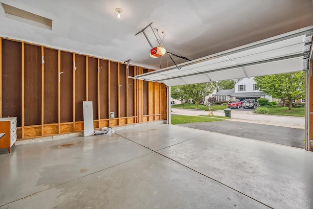 1344 Bluffton Ct, Columbus, OH 43228 - garage featuring a garage door opener