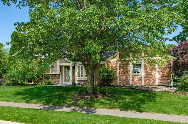 7484 Blue Fox Ln, Columbus, OH 43235 - view of front facade featuring a front yard and brick siding