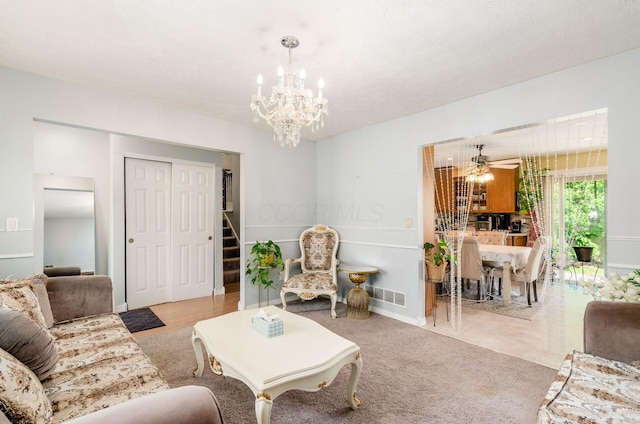 7484 Blue Fox Ln, Columbus, OH 43235 - living area with a chandelier and stairway