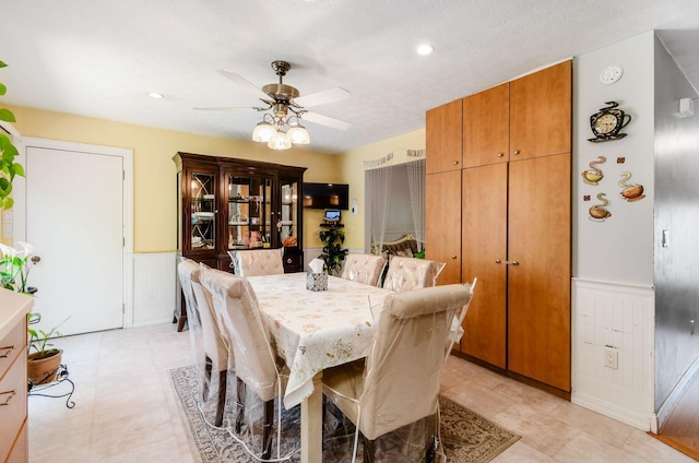 7484 Blue Fox Ln, Columbus, OH 43235 - dining area with a ceiling fan, recessed lighting, and a wainscoted wall