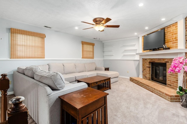 7484 Blue Fox Ln, Columbus, OH 43235 - living area featuring carpet floors, a ceiling fan, a fireplace, and recessed lighting