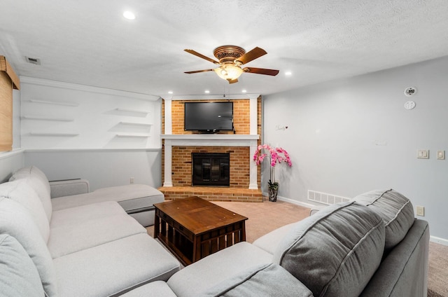 7484 Blue Fox Ln, Columbus, OH 43235 - living area with carpet flooring, ceiling fan, a fireplace, and recessed lighting