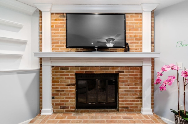 7484 Blue Fox Ln, Columbus, OH 43235 - detailed view of a brick fireplace, a ceiling fan, and crown molding