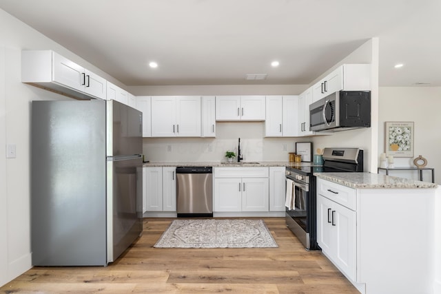 540 Mohawk Dr, Lancaster, OH 43130 - kitchen featuring appliances with stainless steel finishes, white cabinetry, and recessed lighting
