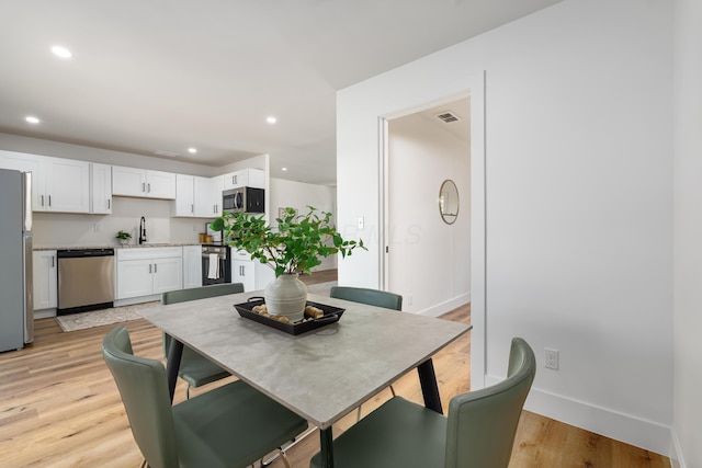 540 Mohawk Dr, Lancaster, OH 43130 - dining area featuring recessed lighting and light wood-style flooring