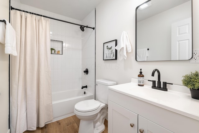 540 Mohawk Dr, Lancaster, OH 43130 - bathroom featuring vanity, wood finished floors, and shower / bath combo with shower curtain