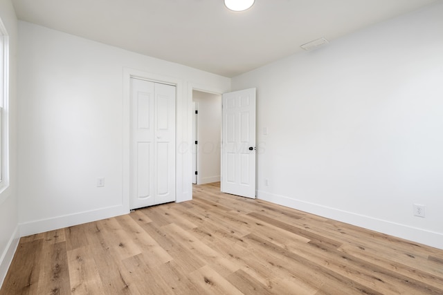 540 Mohawk Dr, Lancaster, OH 43130 - unfurnished bedroom featuring light wood-style flooring and a closet