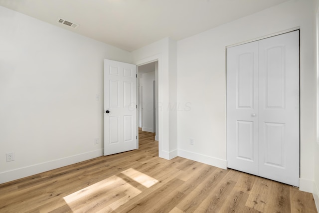 540 Mohawk Dr, Lancaster, OH 43130 - unfurnished bedroom with light wood finished floors and a closet