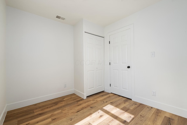 540 Mohawk Dr, Lancaster, OH 43130 - unfurnished bedroom with light wood-type flooring and a closet