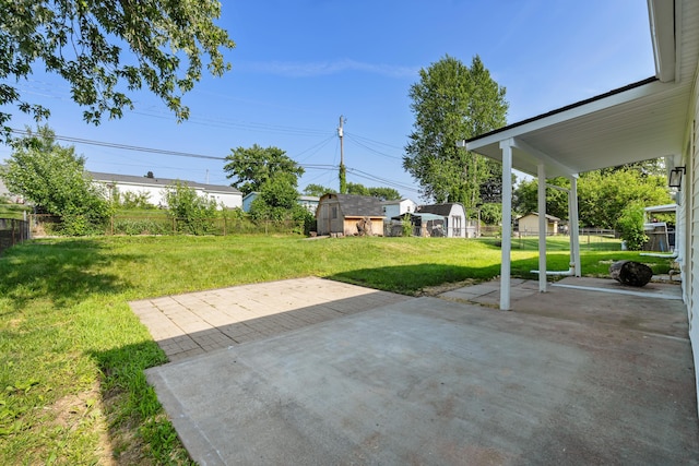 540 Mohawk Dr, Lancaster, OH 43130 - fenced backyard featuring a storage unit and a patio
