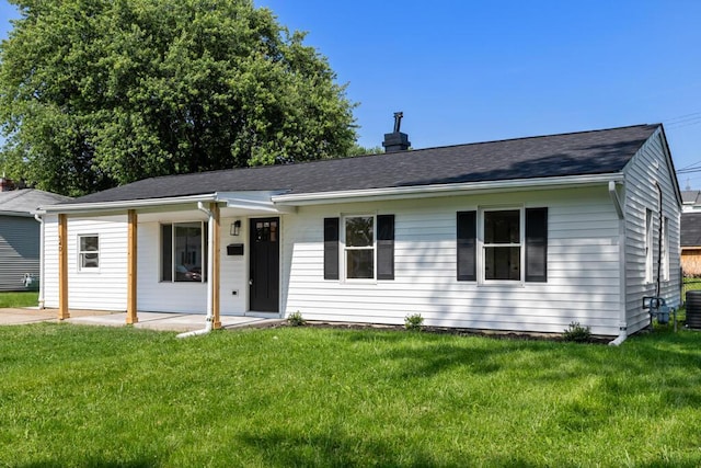 540 Mohawk Dr, Lancaster, OH 43130 - ranch-style home with a front lawn, a shingled roof, a chimney, and a patio area