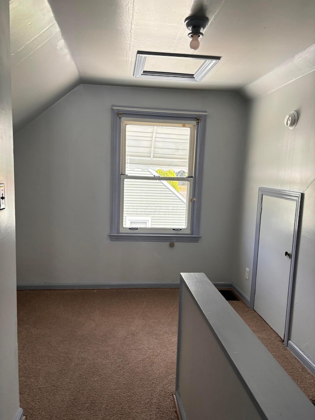 1155 E 26th Ave, Columbus, OH 43211 - hall featuring lofted ceiling and carpet