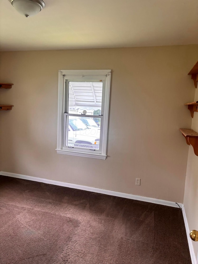1155 E 26th Ave, Columbus, OH 43211 - empty room with carpet and baseboards
