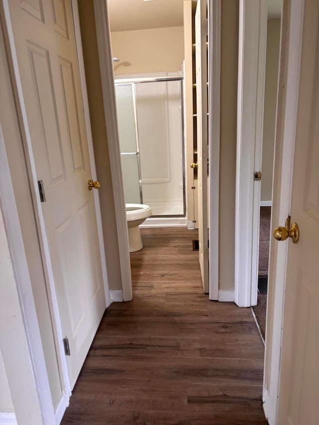 1155 E 26th Ave, Columbus, OH 43211 - hallway with dark wood-style flooring