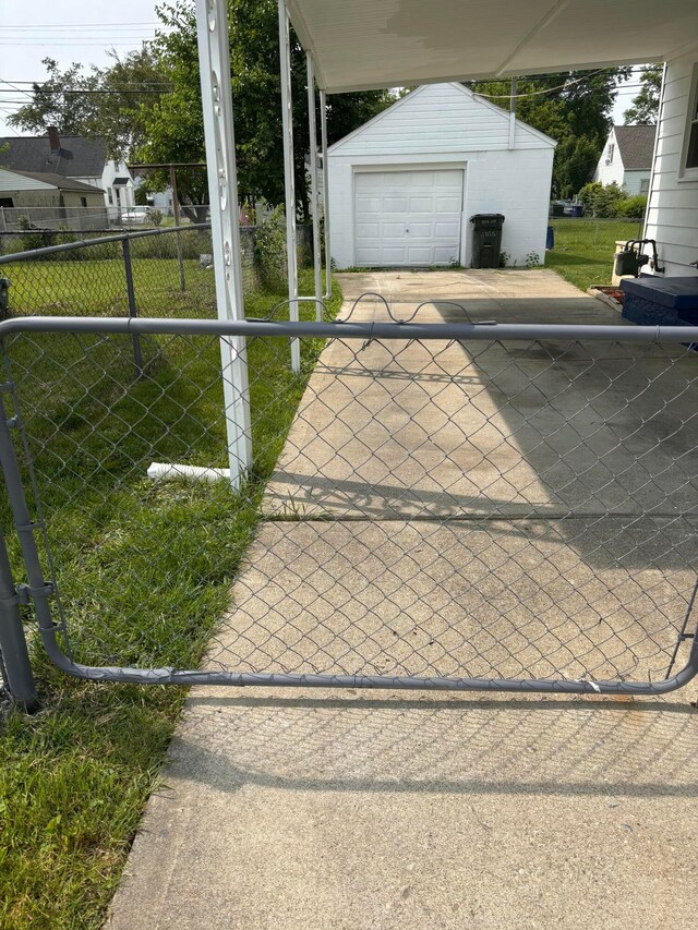1155 E 26th Ave, Columbus, OH 43211 - garage with concrete driveway