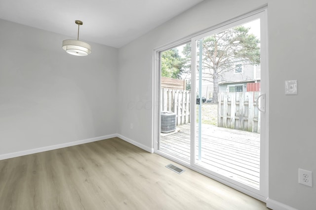 840 Pine Way Dr Unit D2, Columbus, OH 43085 - unfurnished dining area with baseboards and wood finished floors