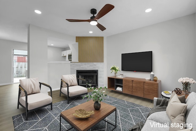 840 Pine Way Dr Unit D2, Columbus, OH 43085 - living room featuring a ceiling fan, wood finished floors, recessed lighting, and a large fireplace