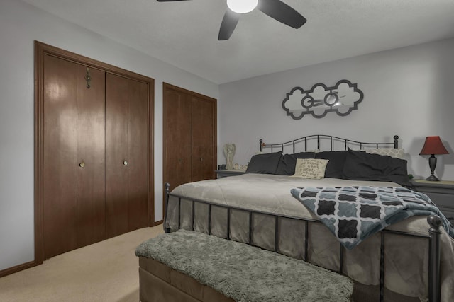 2542 Eckert Rd, Lexington, OH 44904 - bedroom featuring carpet floors, multiple closets, and a ceiling fan