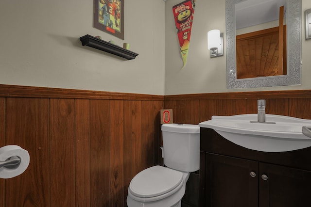 2542 Eckert Rd, Lexington, OH 44904 - half bathroom featuring wainscoting and vanity