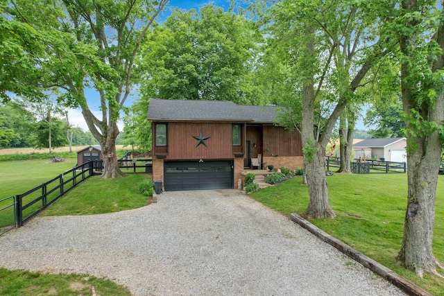 2542 Eckert Rd, Lexington, OH 44904 - view of front facade featuring driveway, an attached garage, roof with shingles, and brick siding