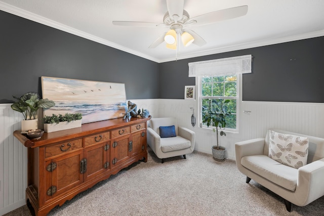 4949 Heath Gate Dr, New Albany, OH 43054 - living area with wainscoting, light carpet, ornamental molding, and ceiling fan