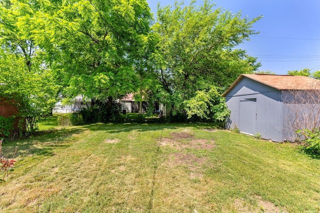 3920 Astor Ave, Columbus, OH 43227 - view of yard with a storage shed