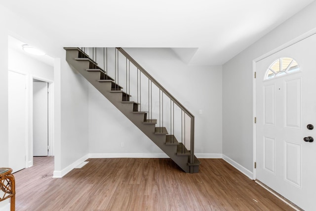 3920 Astor Ave, Columbus, OH 43227 - foyer featuring stairs and wood finished floors