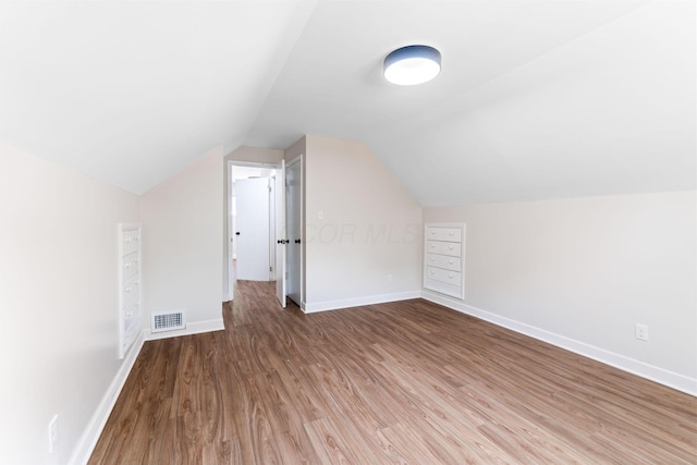 3920 Astor Ave, Columbus, OH 43227 - bonus room featuring wood finished floors and vaulted ceiling