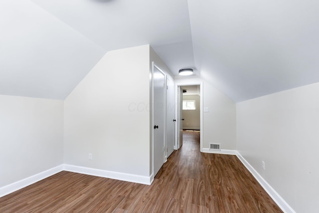 3920 Astor Ave, Columbus, OH 43227 - additional living space featuring dark wood-style flooring and lofted ceiling
