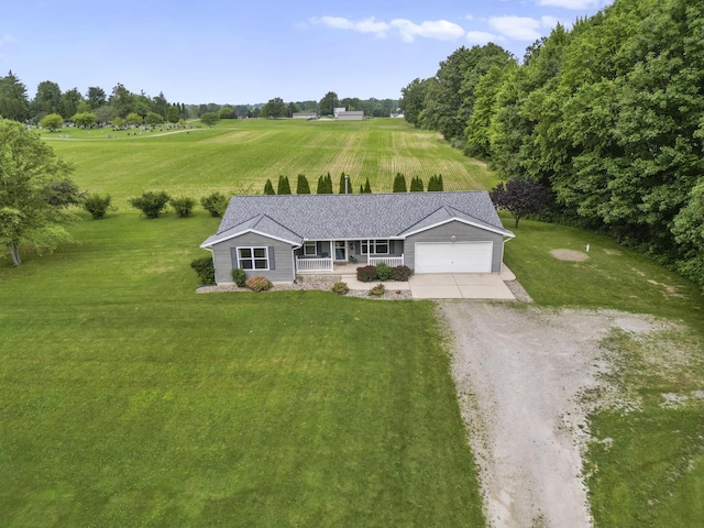 1290 Knorr Rd, Galion, OH 44833 - view of front of home featuring a porch, a garage, driveway, and a front lawn