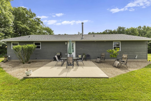 1290 Knorr Rd, Galion, OH 44833 - back of house featuring a lawn and a patio