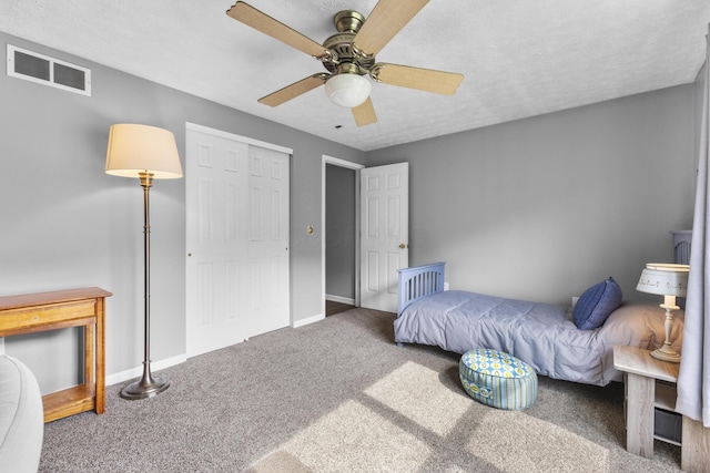 1290 Knorr Rd, Galion, OH 44833 - bedroom with carpet floors, a ceiling fan, and a textured ceiling