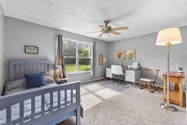 1290 Knorr Rd, Galion, OH 44833 - bedroom featuring carpet, an office area, a textured ceiling, and a ceiling fan