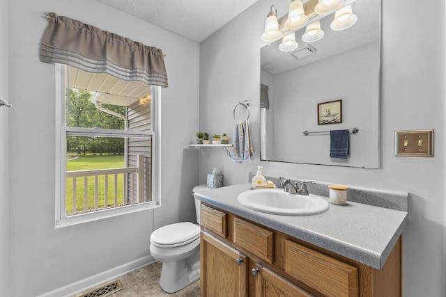 1290 Knorr Rd, Galion, OH 44833 - bathroom featuring a chandelier, vanity, and tile patterned floors