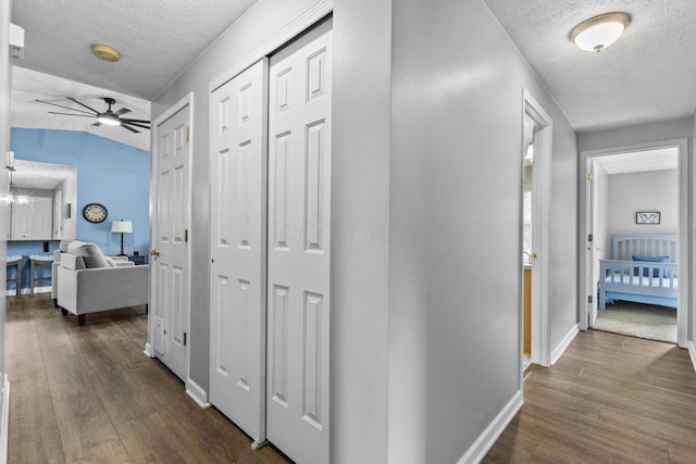 1290 Knorr Rd, Galion, OH 44833 - corridor featuring a textured ceiling and dark wood finished floors