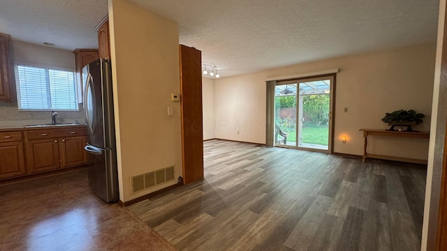 5109 Magnolia Blossom Blvd, Columbus, OH 43230 - interior space with a textured ceiling, plenty of natural light, and wood finished floors