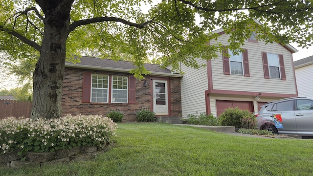 5109 Magnolia Blossom Blvd, Columbus, OH 43230 - split level home featuring brick siding and a garage
