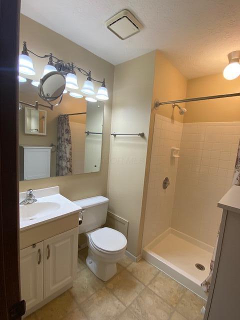 5109 Magnolia Blossom Blvd, Columbus, OH 43230 - full bathroom featuring vanity and a shower with shower curtain