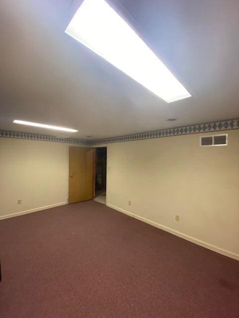 5109 Magnolia Blossom Blvd, Columbus, OH 43230 - empty room with baseboards and dark colored carpet