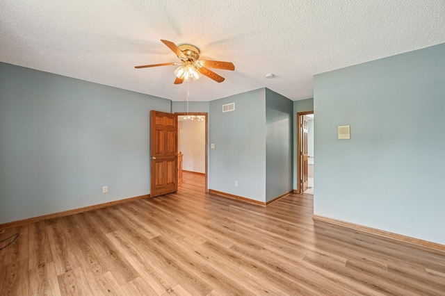 7591 Creekbend Dr, Pickerington, OH 43147 - unfurnished room with light wood-type flooring, ceiling fan, and a textured ceiling