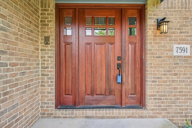 7591 Creekbend Dr, Pickerington, OH 43147 - doorway to property with brick siding