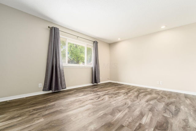 5032 Labelle Dr, Columbus, OH 43232 - spare room featuring wood finished floors and recessed lighting