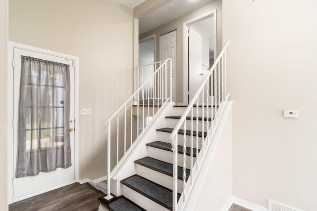 5032 Labelle Dr, Columbus, OH 43232 - stairway with wood finished floors and baseboards