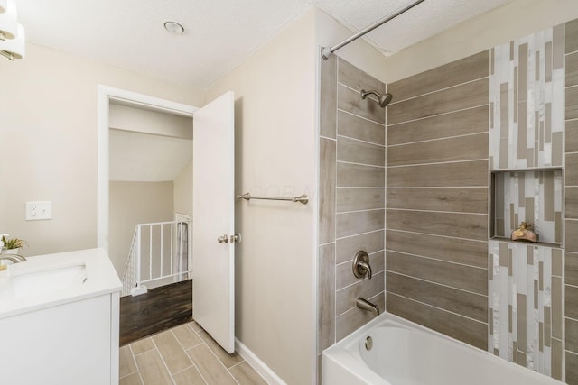 5032 Labelle Dr, Columbus, OH 43232 - bathroom with shower / bath combination, vanity, and a textured ceiling