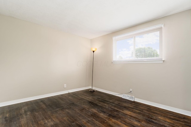 5032 Labelle Dr, Columbus, OH 43232 - spare room with dark wood-type flooring and baseboards