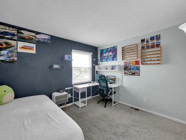 4809 King Albert Dr Unit 1A, Hilliard, OH 43026 - carpeted bedroom featuring baseboards and a textured ceiling