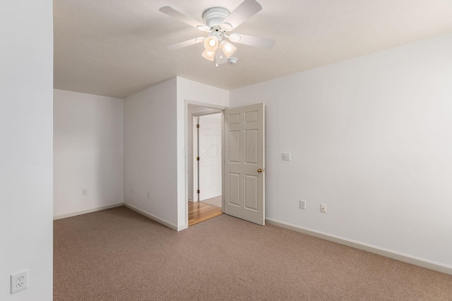 8209 Farm Crossing Cir, Powell, OH 43065 - empty room featuring light colored carpet and a ceiling fan